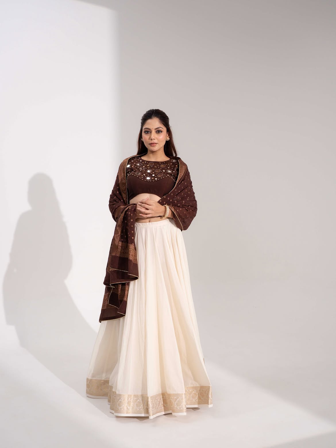 Chocolate Brown Mirror Work Blouse with Off-White Flared Lehenga & Dupatta Set